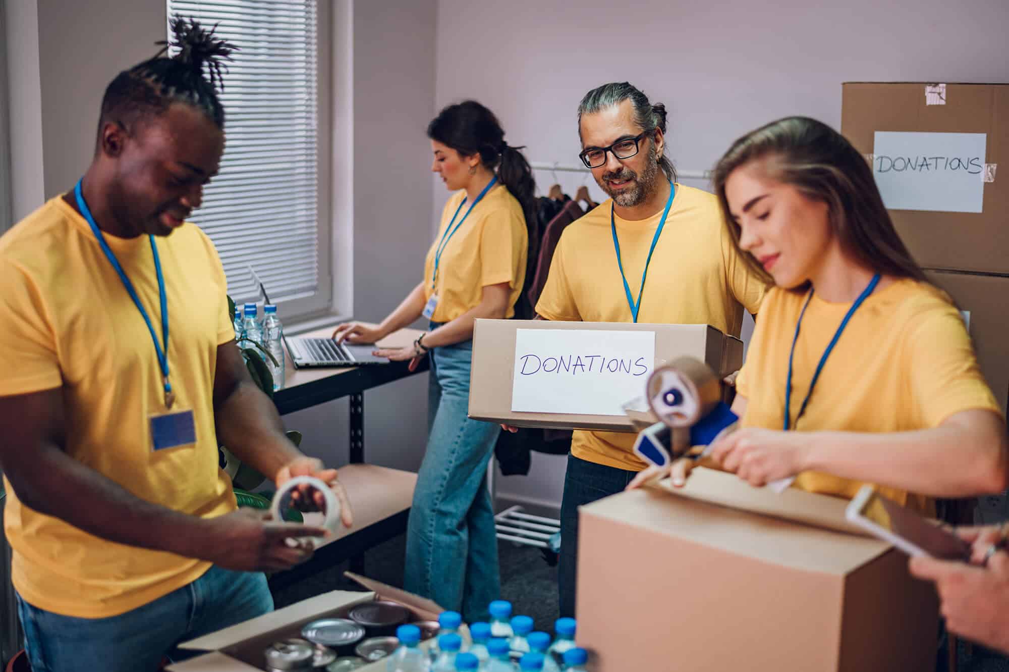 group-of-multiracial-volunteers-working-in-communi-2023-11-27-05-09-15-utc-1